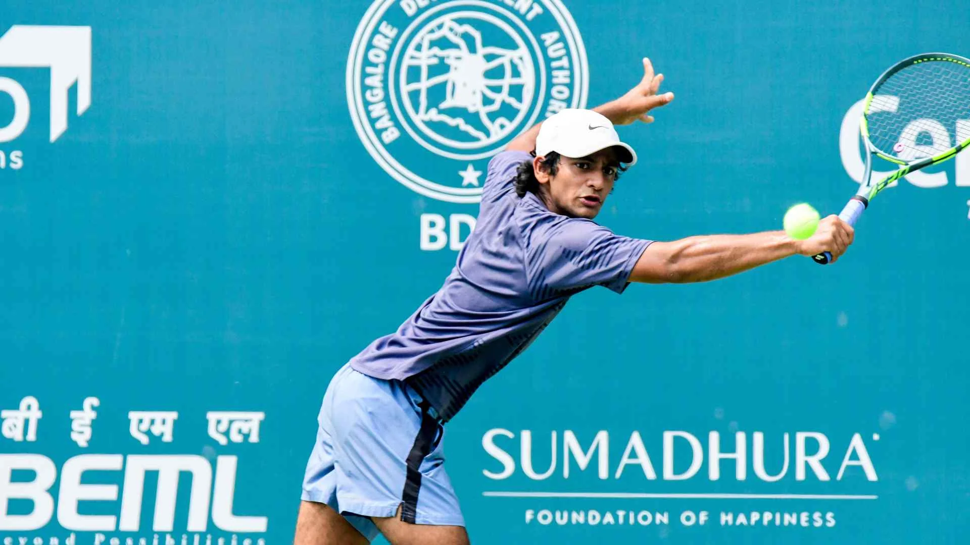 Aradhya Kshitij striking a forehand at the Bengaluru Challenger